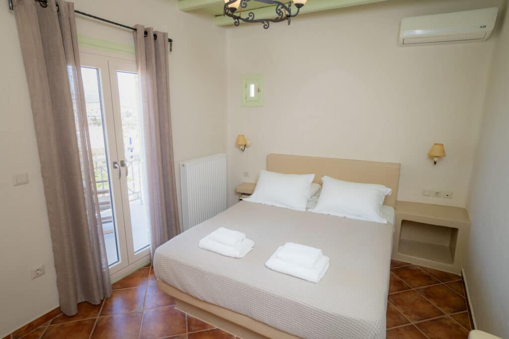 places-to-stay-in-koufonissia-top-floor-apartment-3 svg+xml;charset=utf